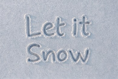 Handwritten letters across a snowy surface.