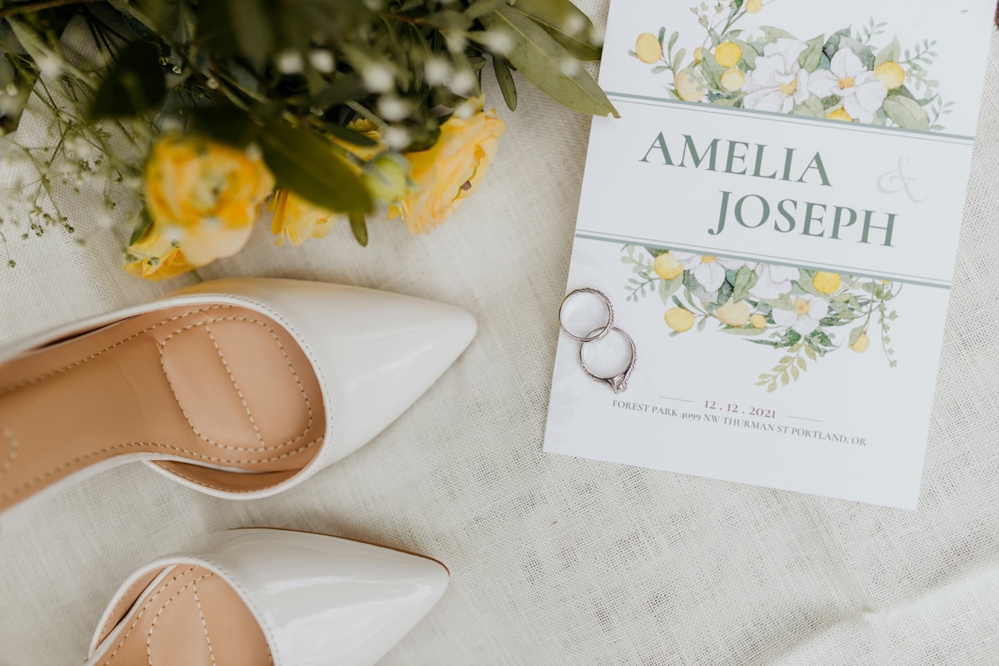 Wedding card and engagement rings.
